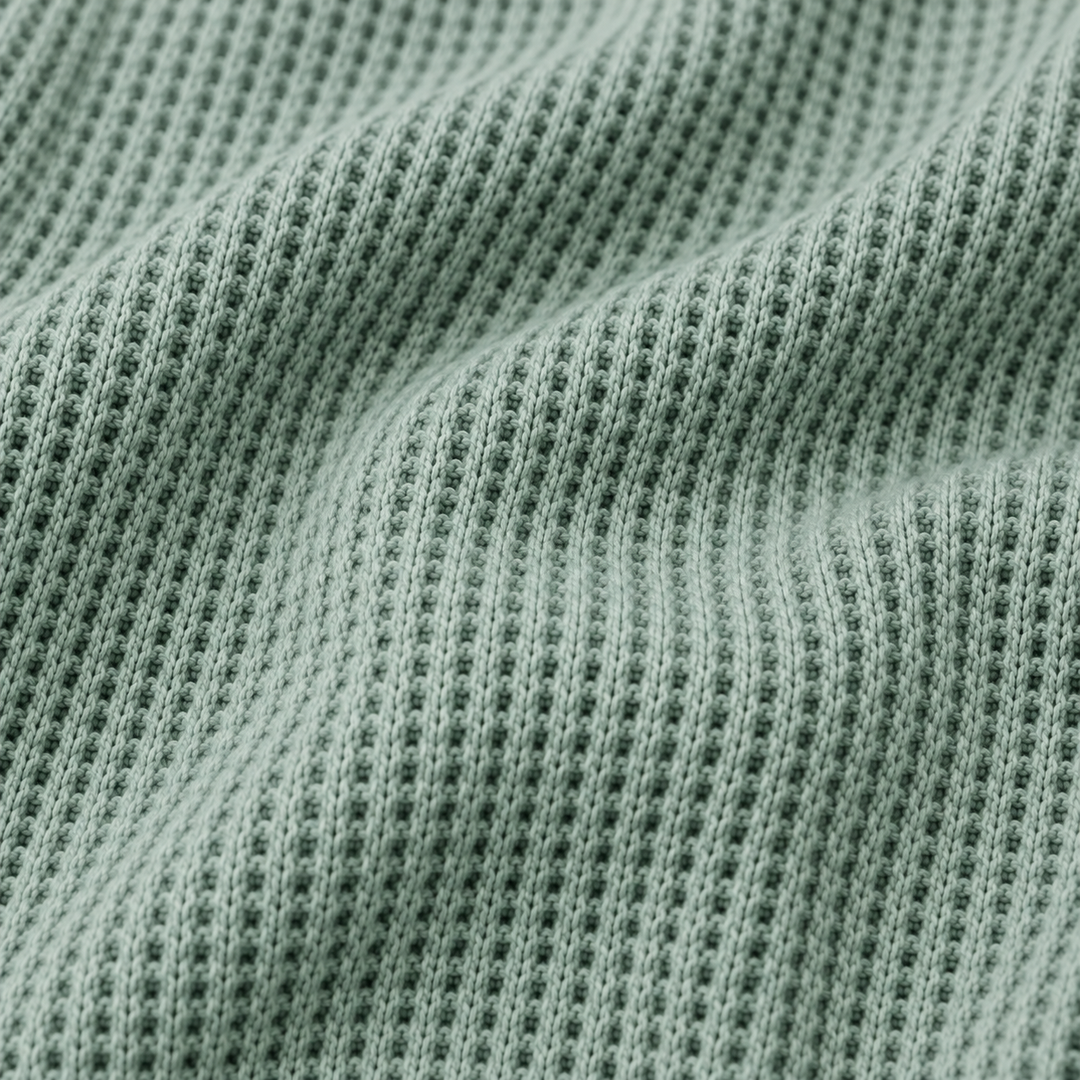 Close-up of PAIGELAUREN soft mineral wash thermal fabric in Sage