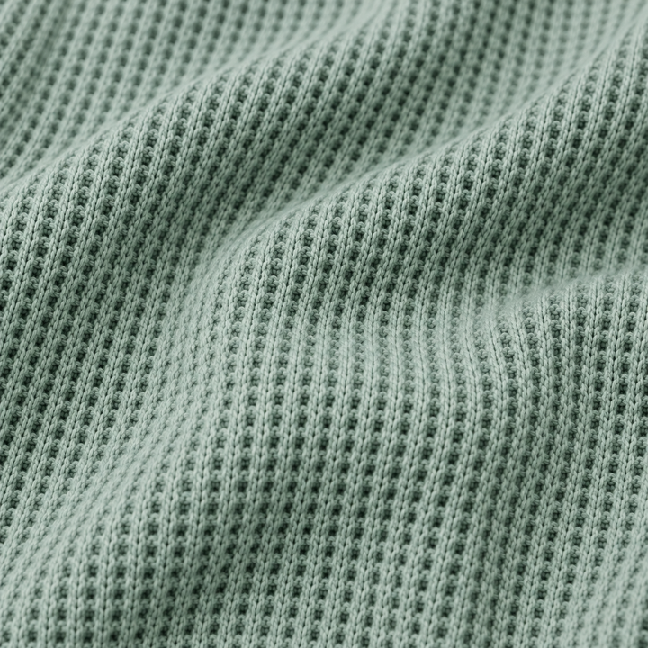 Close-up of PAIGELAUREN soft mineral wash thermal fabric in Sage