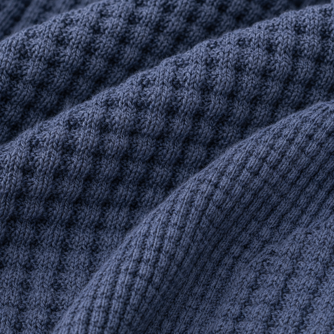 Close-up of the PAIGELAUREN navy Chunky Thermal waffle knit texture.