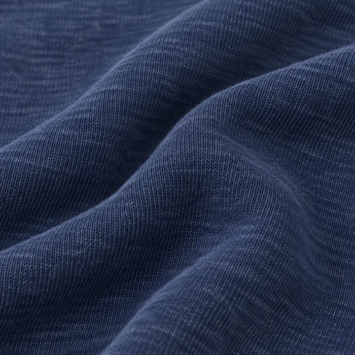 Close-up of PAIGELAUREN soft Navy heathered fleece fabric