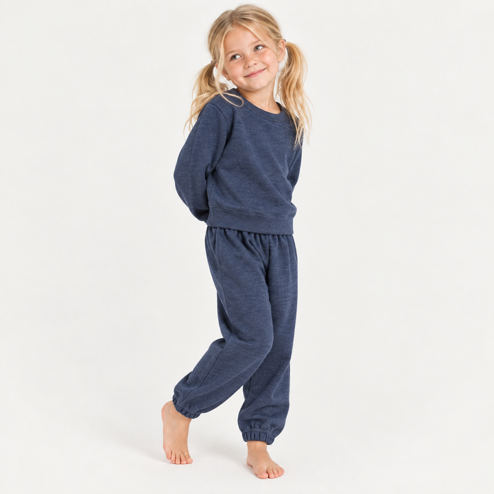 Kid in PAIGELAUREN soft Navy Fleece Sweatshirt and Sweatpant Set