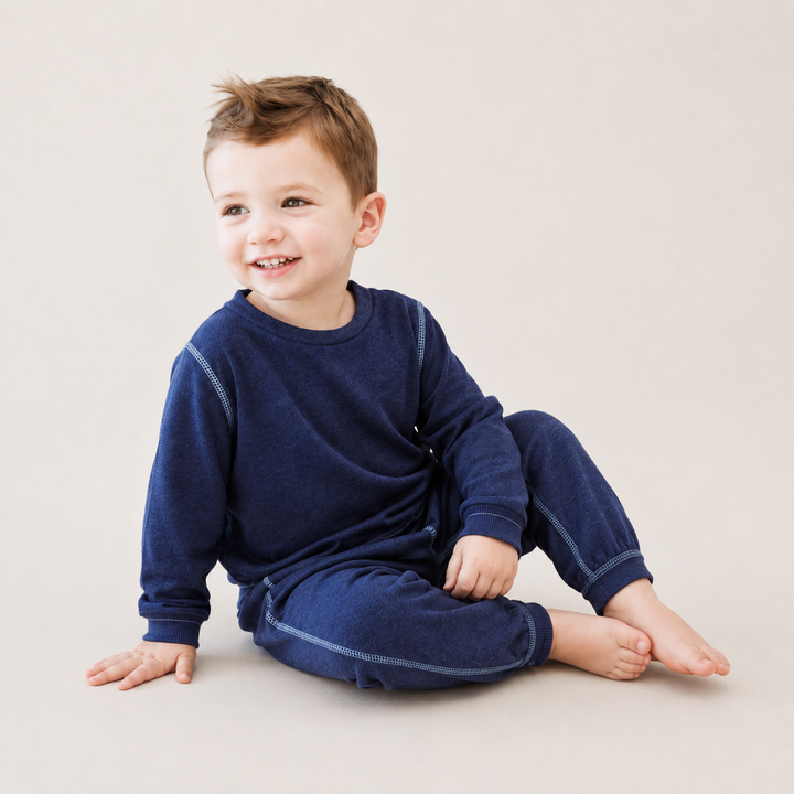 Toddler wearing PAIGELAUREN Lightweight Navy Hacci Pullover & Pant Loungewear Set