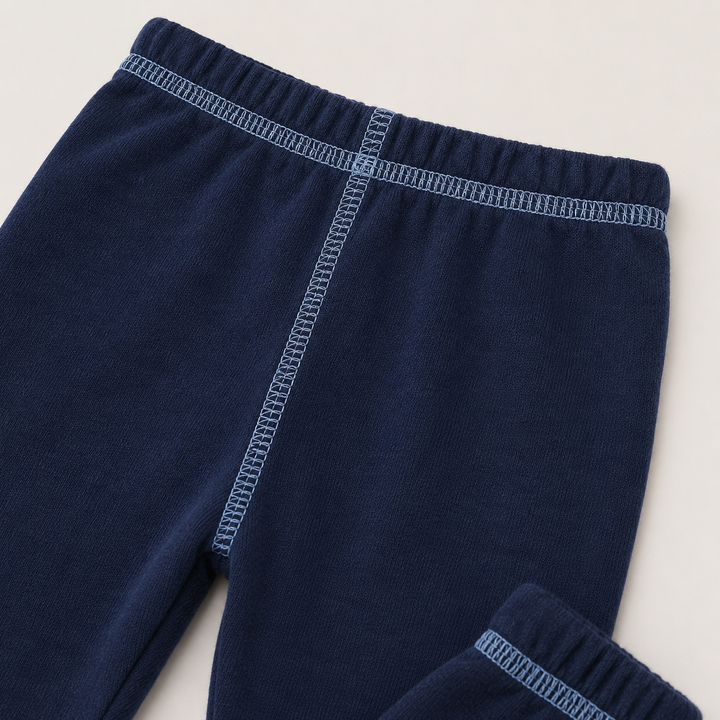 Close-up of PAIGELAUREN Navy Hacci Pant with light blue contrast topstitching