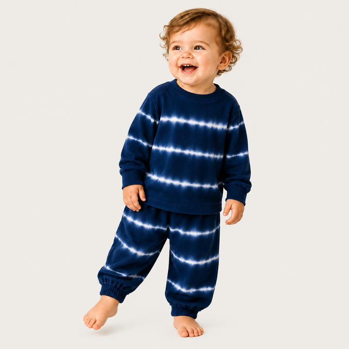 Toddler wearing PAIGELAUREN Navy Hand Dyed Stripe Rib Pullover and Pant Set
