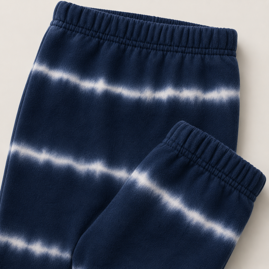 PAIGELAUREN Navy Hand Dyed Stripe Rib Pant with gathered elastic ankle detail