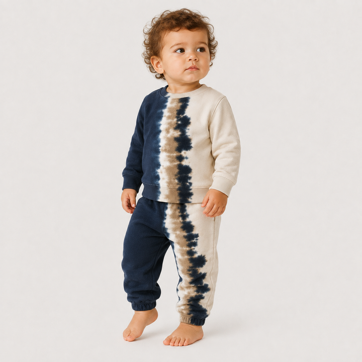 Toddler wearing the PAIGELAUREN Super Soft Fleece Tie Dye Set in Navy Tie Dye