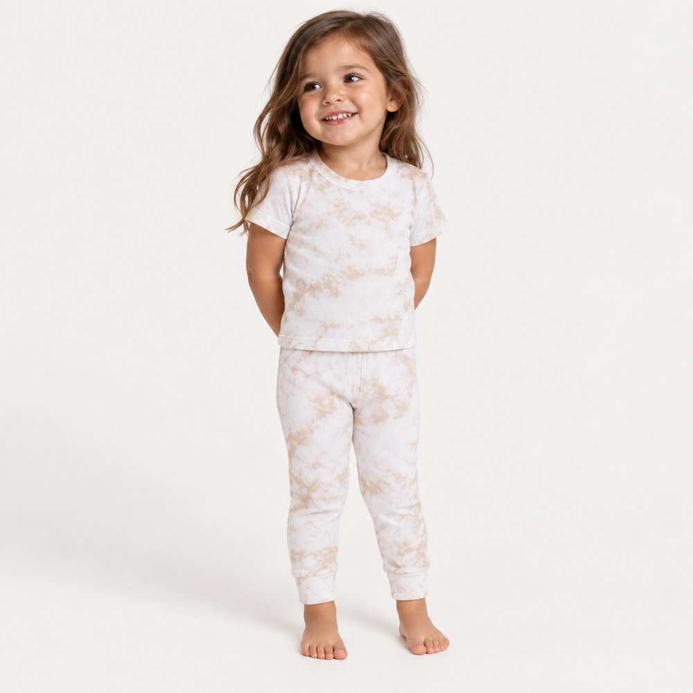 Toddler wearing PAIGELAUREN Oat Crystal Rib Tee + Legging Set