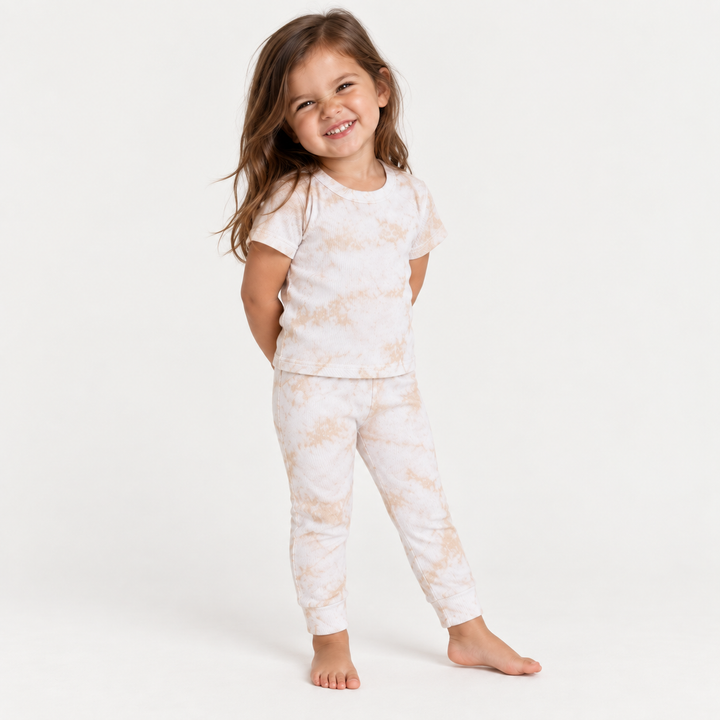 Toddler modeling PAIGELAUREN Oat Crystal Rib Tee + Legging Set