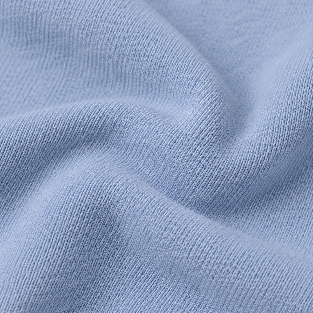 Close-up of ultra-soft PAIGELAUREN Blue Sherpa fabric