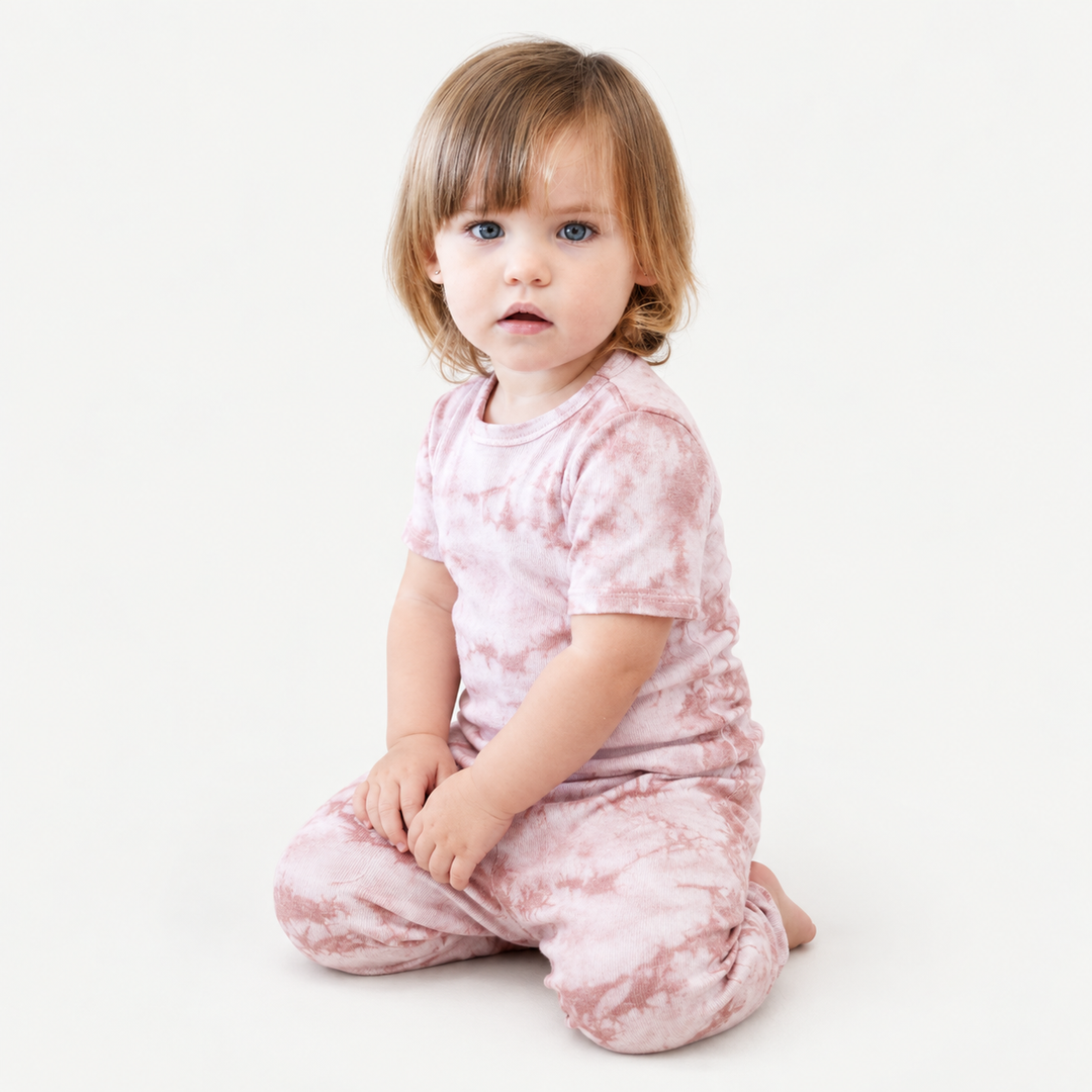 Toddler wearing PAIGELAUREN Pink Crystal Rib Tee + Legging Set