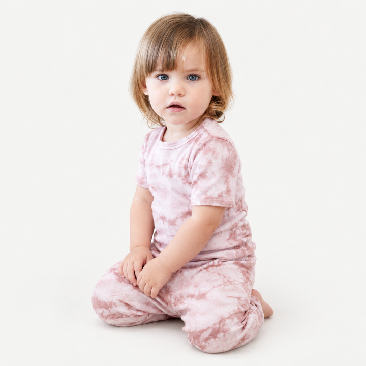 Toddler wearing PAIGELAUREN Pink Crystal Rib Tee + Legging Set