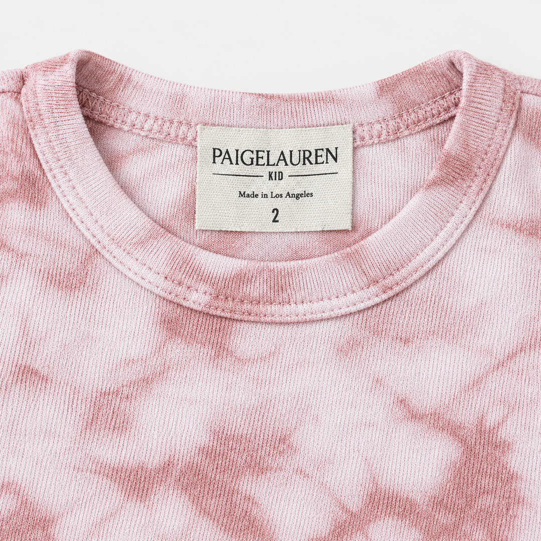 Close-up of PAIGELAUREN Pink Crystal Rib fabric and hand-dyed texture
