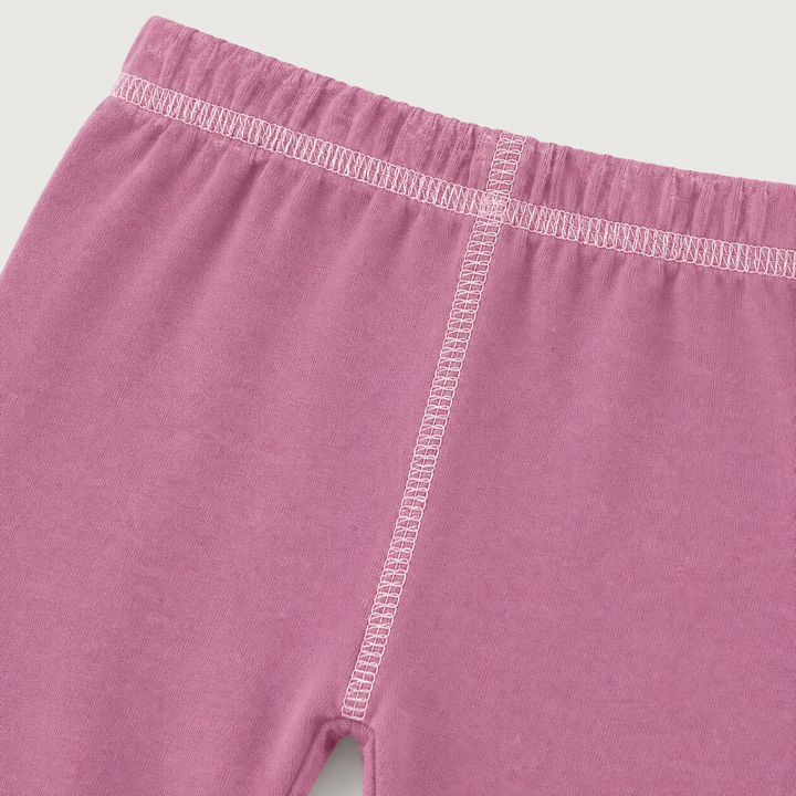 Close-up of PAIGELAUREN Pink Hacci Pant with light pink contrast topstitching