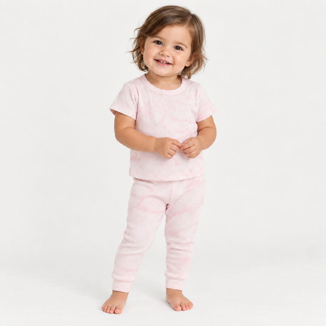 Toddler wearing PAIGELAUREN Pink Marble 2x1 Rib Tee + Legging Set