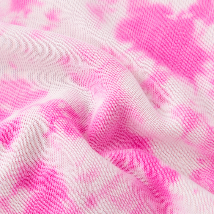 Close-up of PAIGELAUREN pink marble lightweight French terry fabric