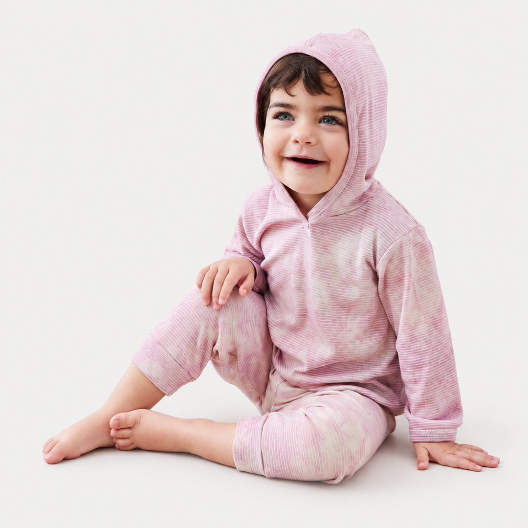 Toddler modeling PAIGELAUREN Pink Marble Stripe Hoodie + Pant Set