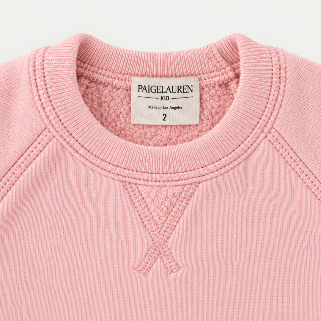 Pink Sherpa sweatshirt ribbed neckline, raglan seams, triangle detail and plush sherpa interior