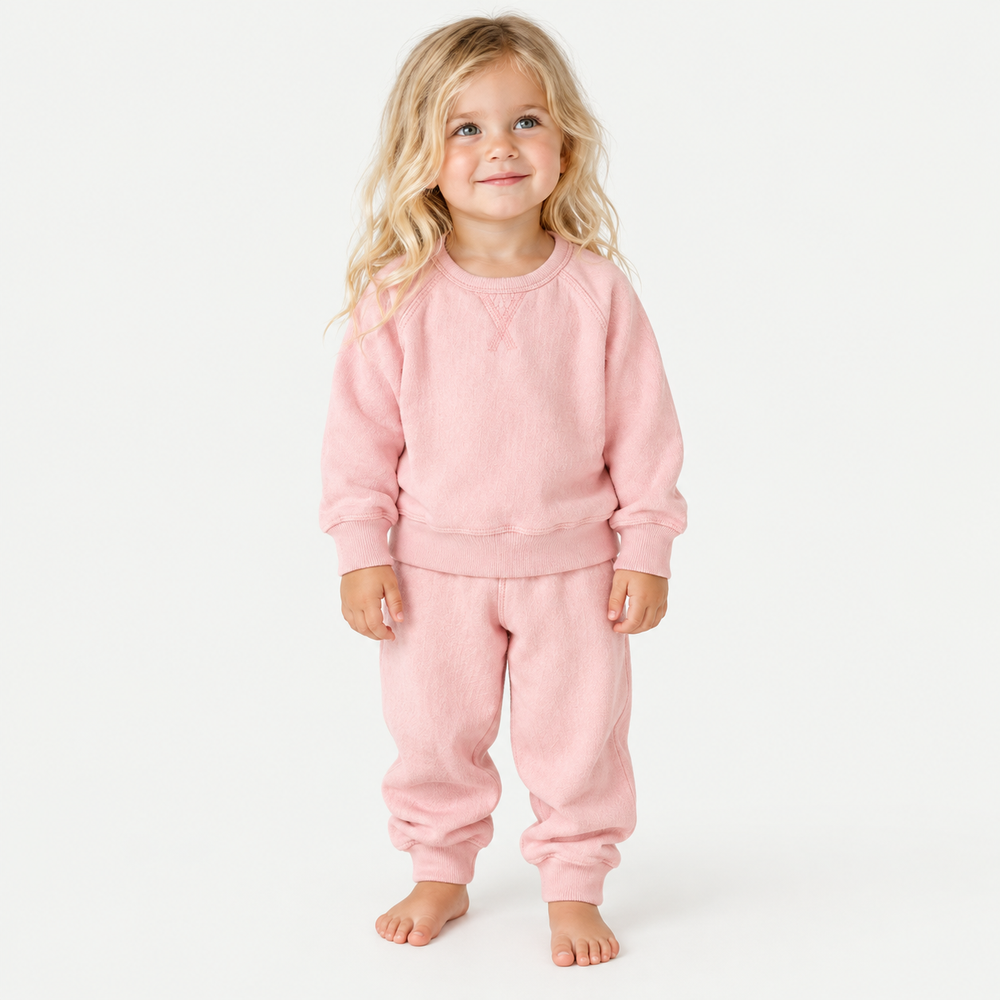 Toddler wearing PAIGELAUREN Pink Sherpa Raglan Sweatshirt and Jogger Set