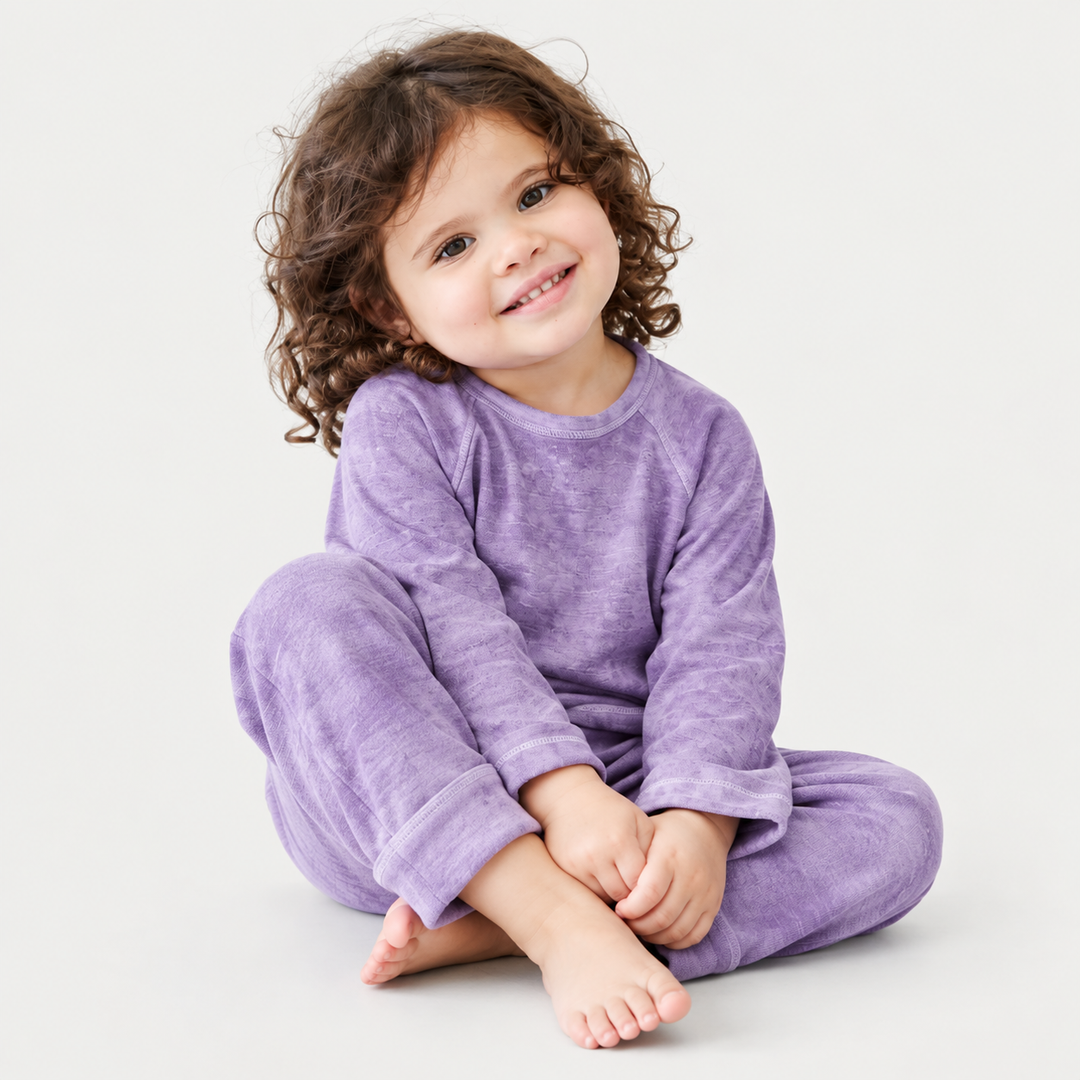 Child wearing PAIGELAUREN purple marble slub rib tee and jogger set