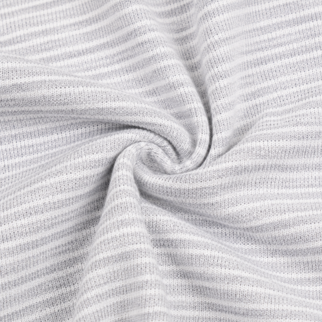 Close-up of soft Heathered Gray striped rib fabric on PAIGELAUREN baby footie pajama