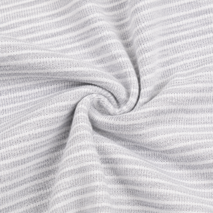 Close-up of soft Heathered Gray striped rib fabric on PAIGELAUREN baby footie pajama