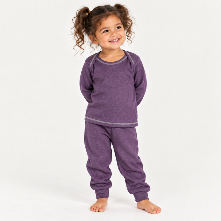 Toddler wearing PAIGELAUREN Purple Rib Lap Tee + Legging Set