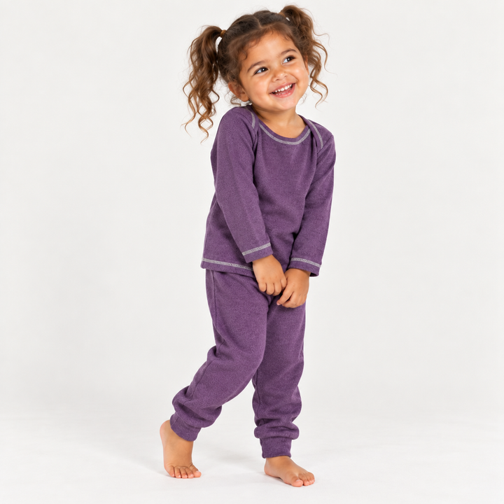 Toddler modeling PAIGELAUREN Purple Rib Lap Tee + Legging Set