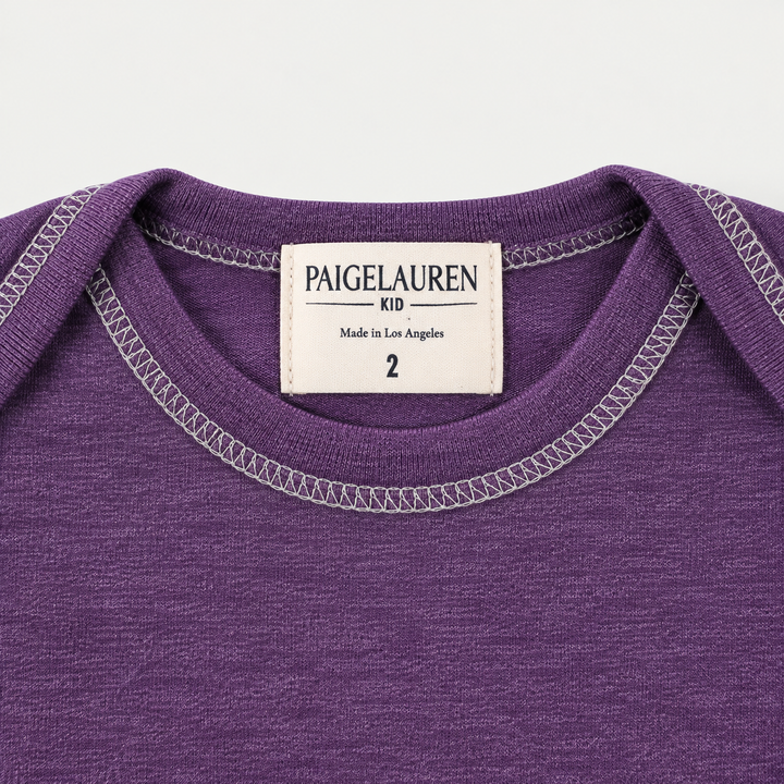 PAIGELAUREN Purple Rib Lap Tee lap shoulder neckline and label detail