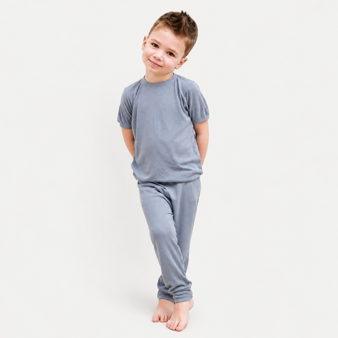 Toddler wearing PAIGELAUREN Rib Tee + Legging Set in Gray
