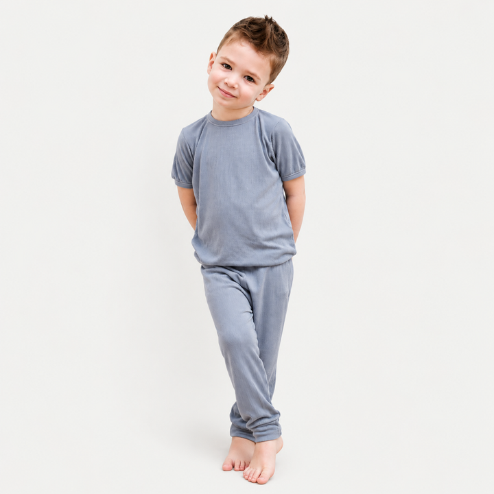 Toddler wearing PAIGELAUREN Rib Tee + Legging Set in Gray