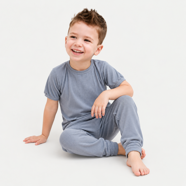 Toddler modeling PAIGELAUREN soft Gray Rib Tee + Legging Set