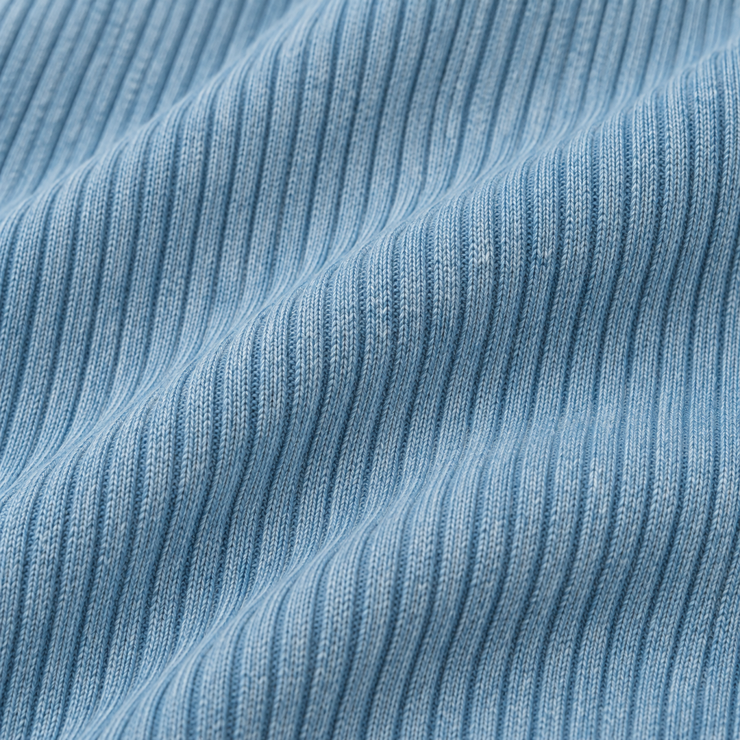 Close-up of PAIGELAUREN soft 2x1 Rib fabric in Green Blue
