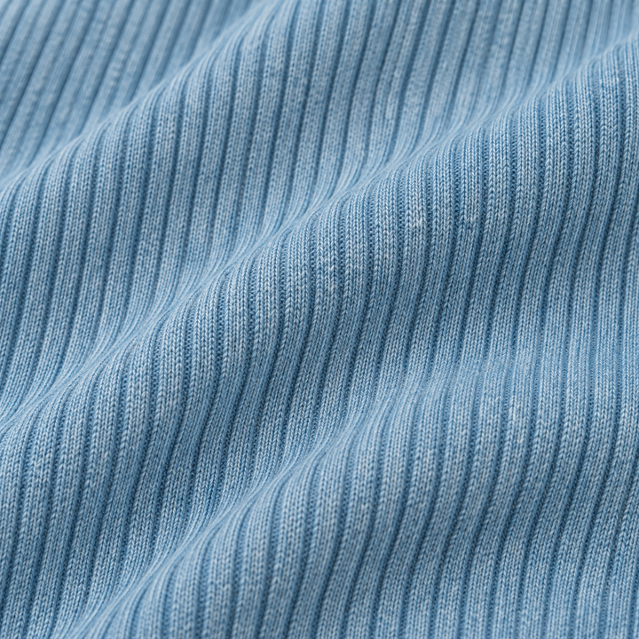 Close-up of PAIGELAUREN soft 2x1 Rib fabric in Green Blue
