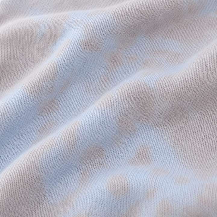 Close-up of soft rib fabric on PAIGELAUREN pink and blue Tie Dye Pajama