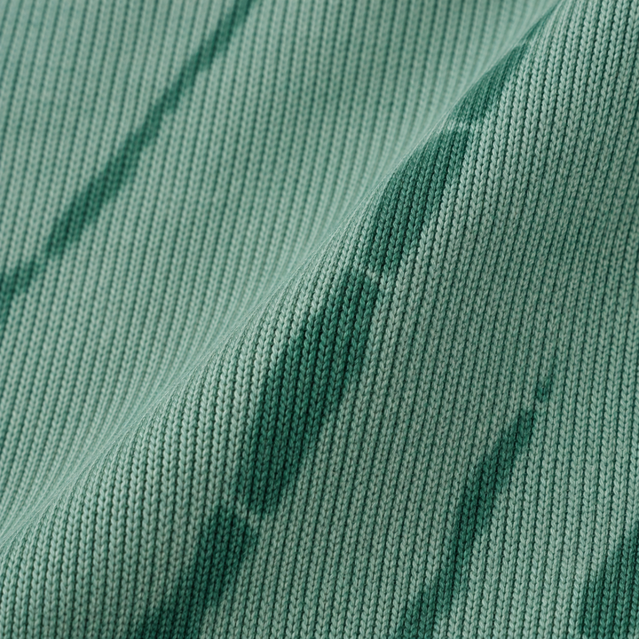 Close-up of the soft cotton rib knit and hand-dyed tonal finish. Green