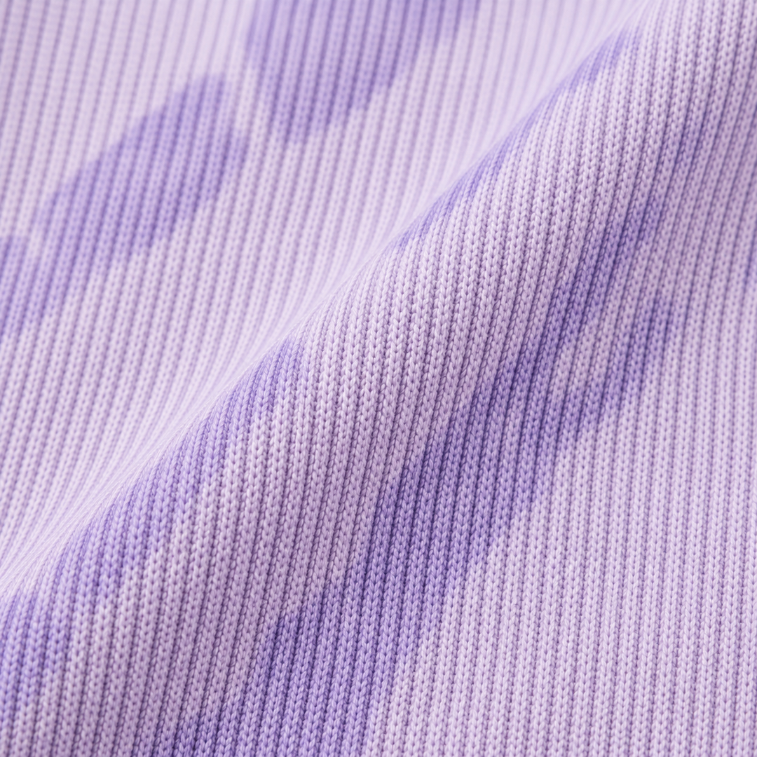 Close-up of the soft cotton rib knit and hand-dyed tonal finish. Lavender