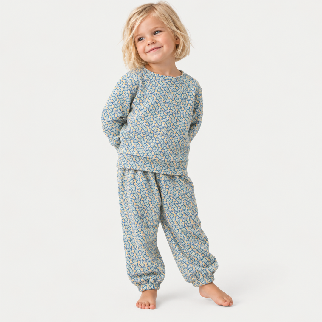 Kid wearing PAIGELAUREN Sage Polka Dot Sweatshirt and Sweatpant Set