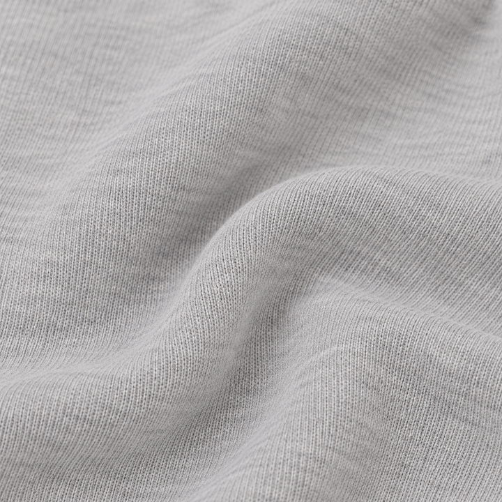 Close-up of PAIGELAUREN Heather Gray slub rib fabric texture