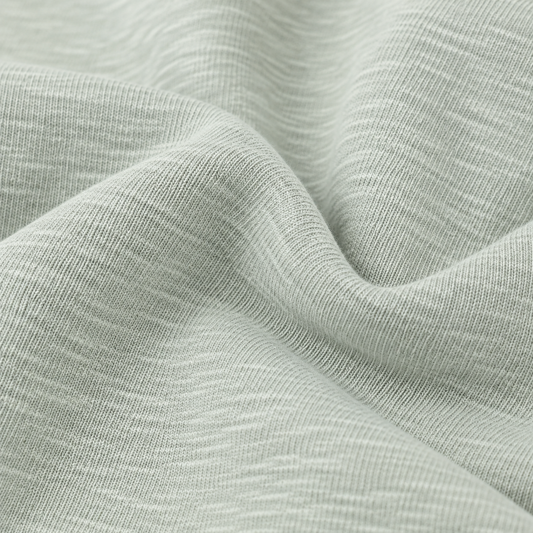 Close-up of PAIGELAUREN Sage slub rib fabric texture