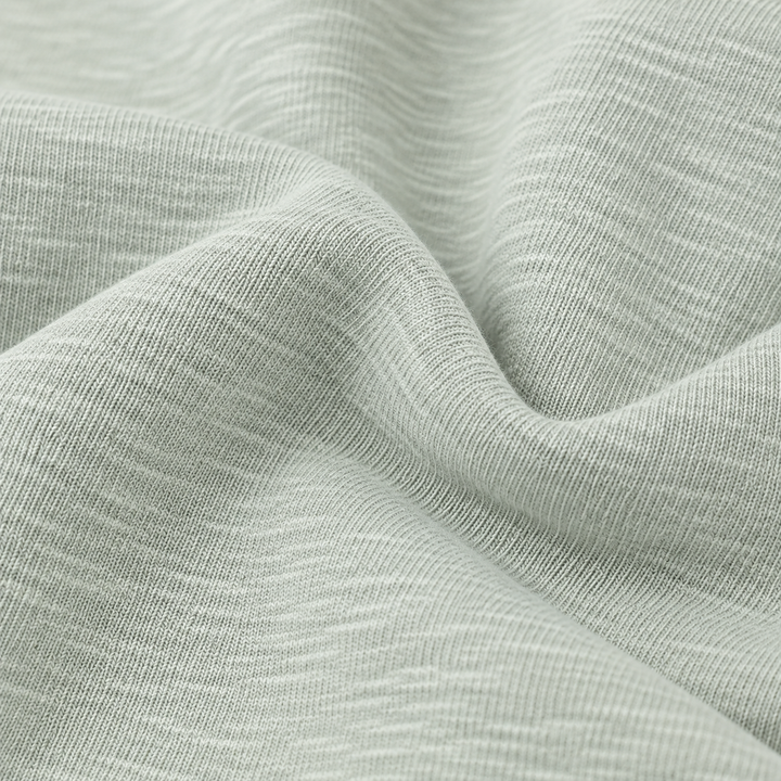 Close-up of PAIGELAUREN Sage slub rib fabric texture