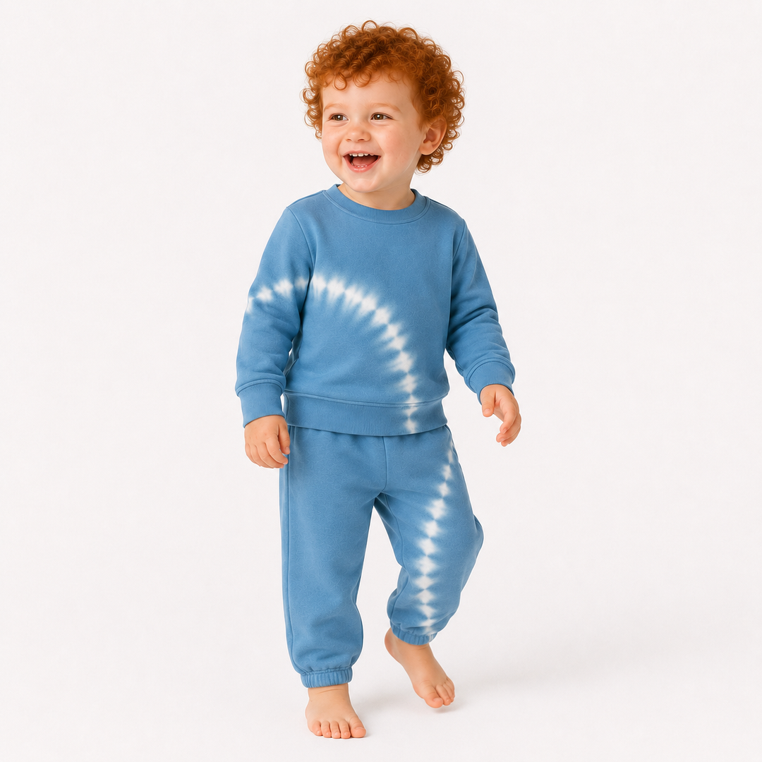 Toddler wearing PAIGELAUREN Teal Tie Dye Fleece Sweatshirt and Sweatpant Set