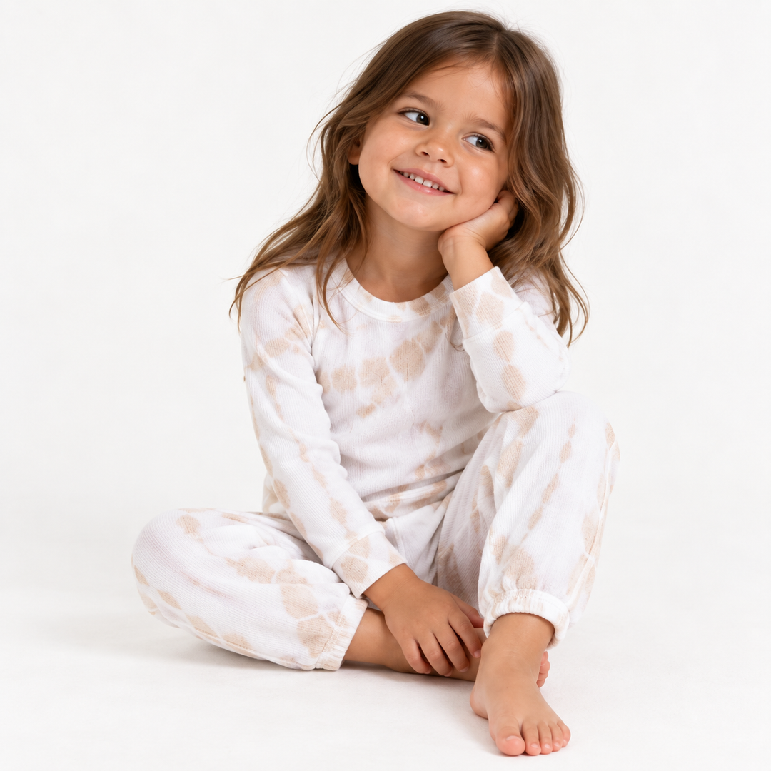 Toddler wearing PAIGELAUREN Beige Tie Dye Rib Pullover + Pant Set