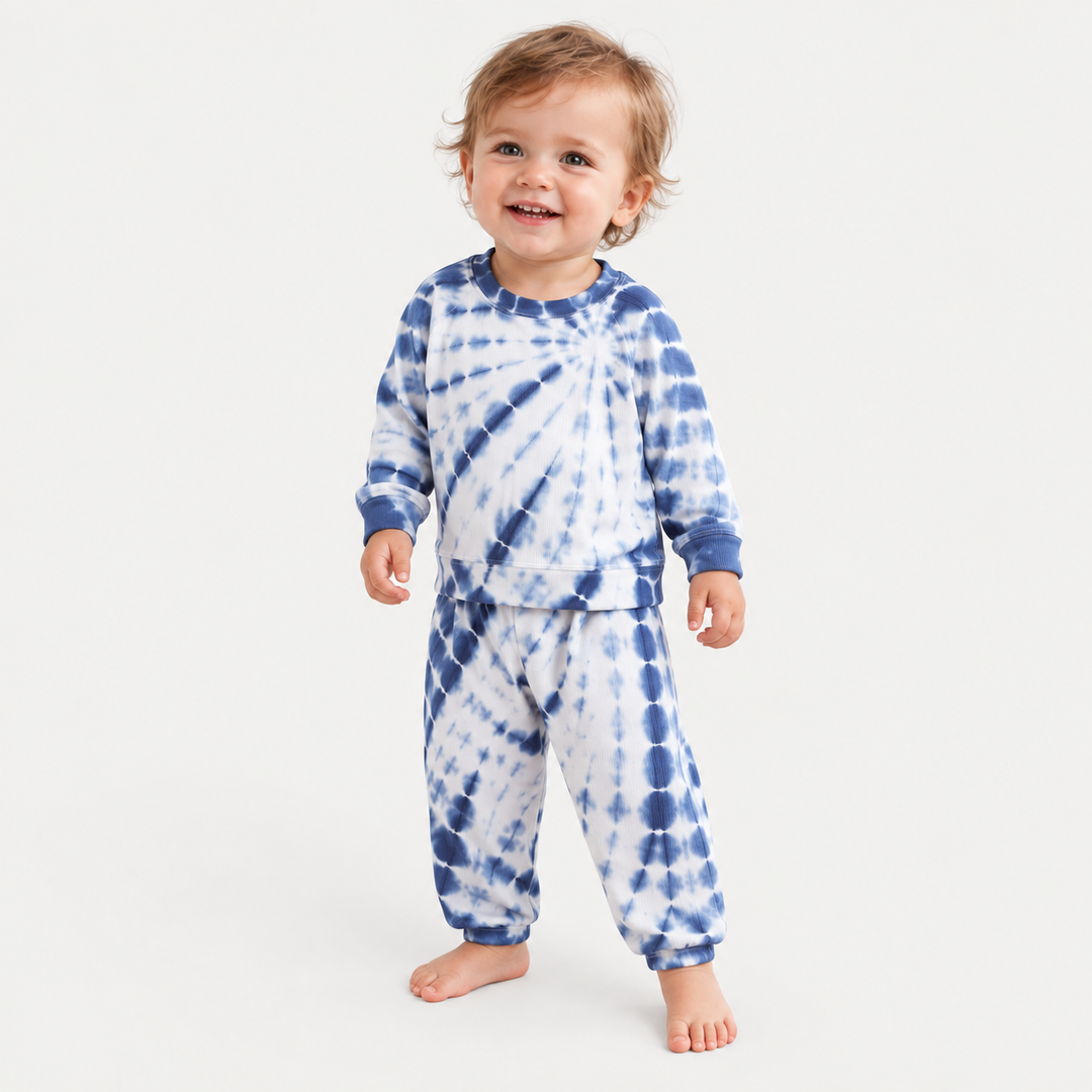 Toddler wearing PAIGELAUREN Blue Tie Dye Rib Pullover + Pant Set