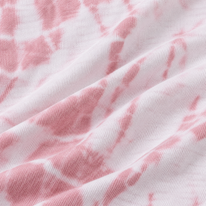 Close-up of PAIGELAUREN Rose Pink tie dye baby rib fabric
