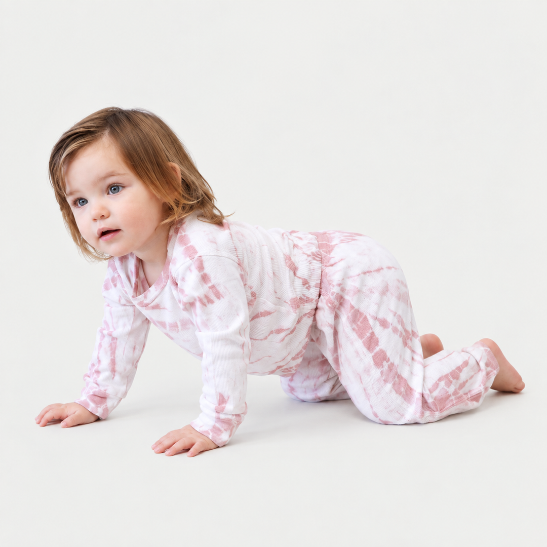 Toddler wearing PAIGELAUREN Rose Pink Tie Dye Rib Pullover + Pant Set