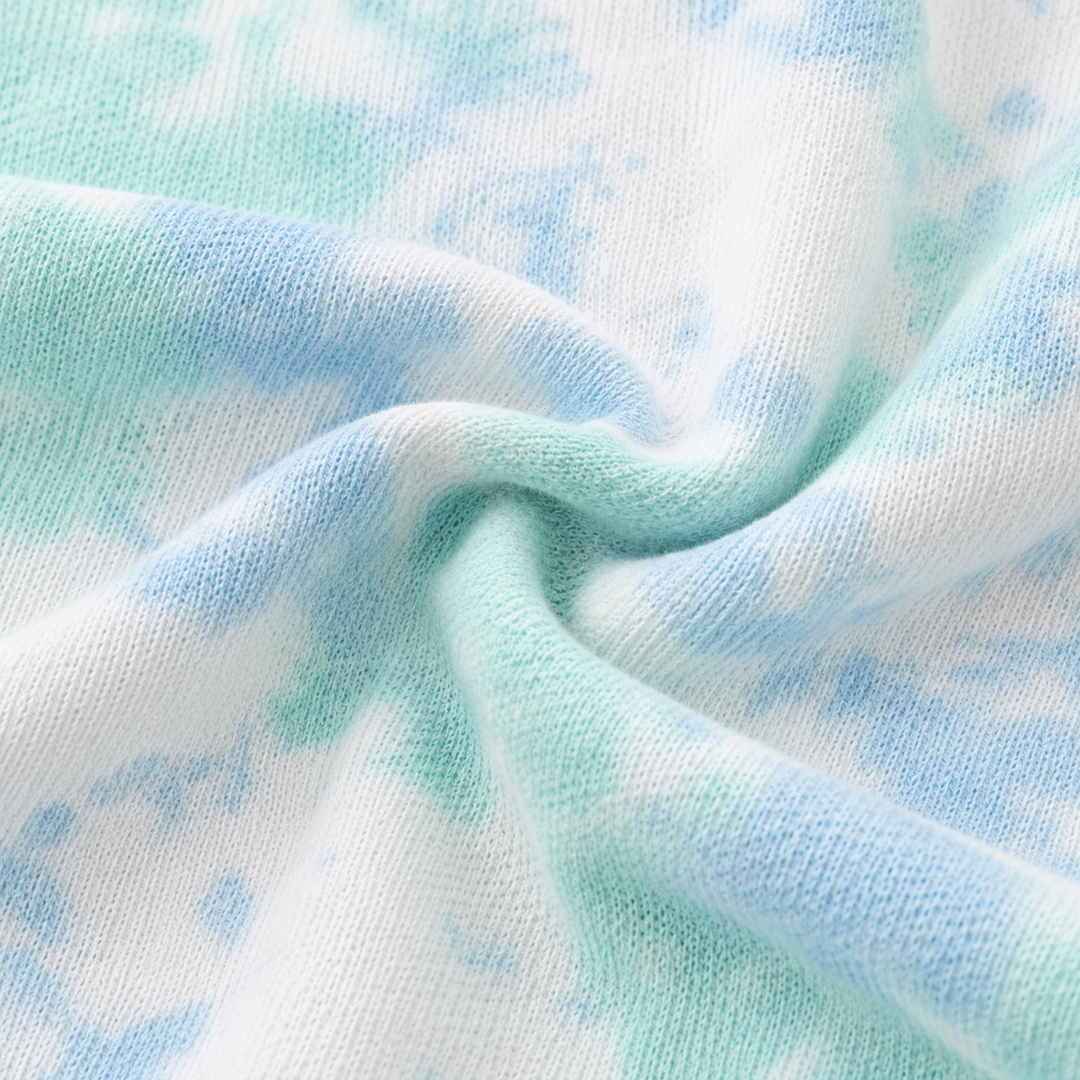 Close-up of PAIGELAUREN turquoise marble lightweight French terry fabric