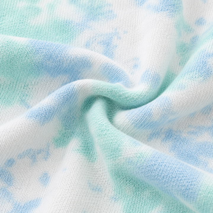 Close-up of PAIGELAUREN turquoise marble lightweight French terry fabric