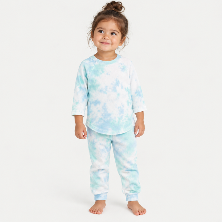 Toddler wearing PAIGELAUREN turquoise marble French terry tee and jogger set