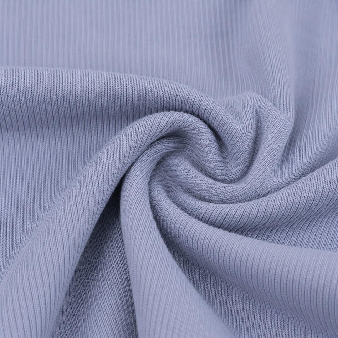 Close-up of soft variegated rib blue fabric with mixed baby rib and wider rib texture
