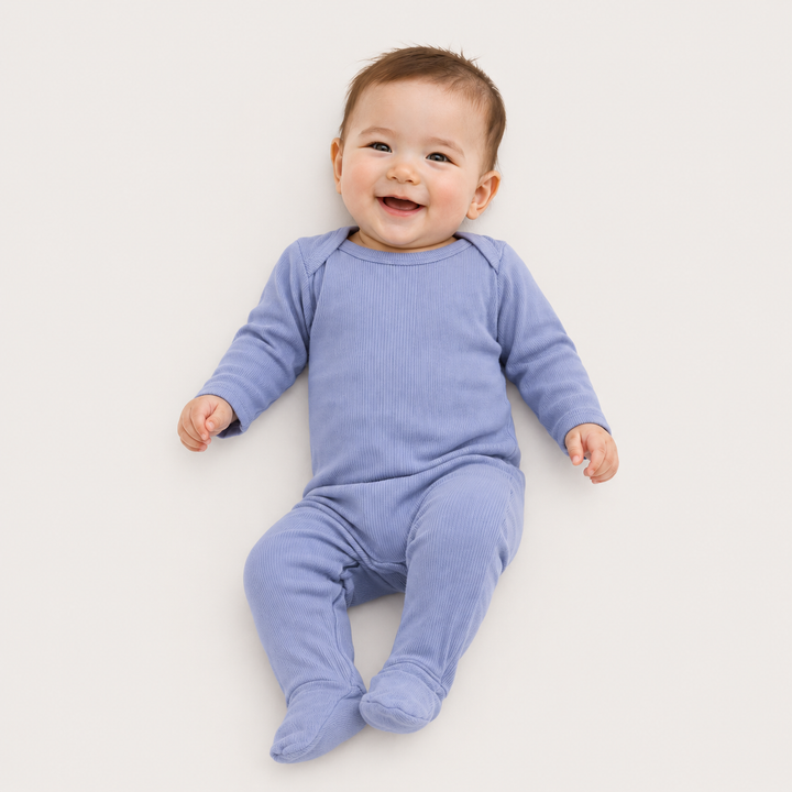 Baby wearing PAIGELAUREN Variegated Rib Lap Tee Blue Footie Pajama